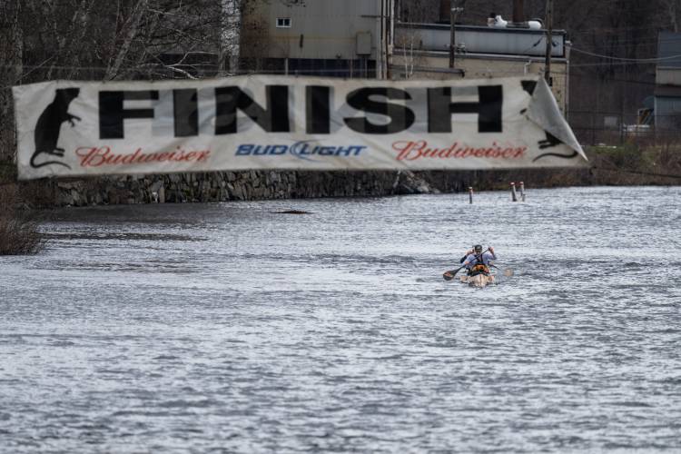 Canoe No. 3, paddled by Ryan Zaveral and Shane MacDowell, was the first to cross the finish line in the 59th running of the River Rat Race on Saturday.
