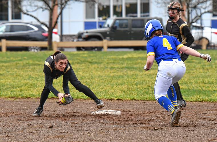 Pioneer shortstop Allison Clary tags out Mohawk Trail baserunner Addie Loomis during the visiting Warriors’ 19-4 victory in Northfield on Thursday.