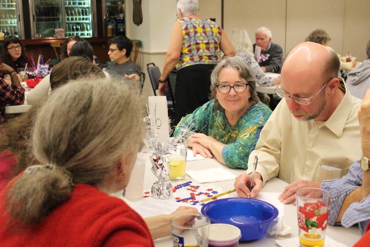 Trivia teams brainstorm answers to civics-related questions during a trivia night organized by the League of Women Voters of Franklin County at the Greenfield Elks Lodge in 2017. This year’s trivia night will be held on Saturday, April 27.
