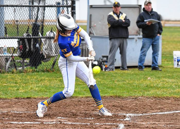 Mohawk Trail’s Rachel Pease connects for a base hit against Pioneer during the visiting Warriors’ 19-4 victory in Northfield on Thursday.