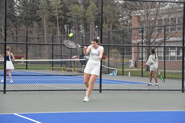 Turners Falls’ Olivia Wolbach returns a volley in No. 1 singles against Frontier on Wednesday in South Deerfield. 