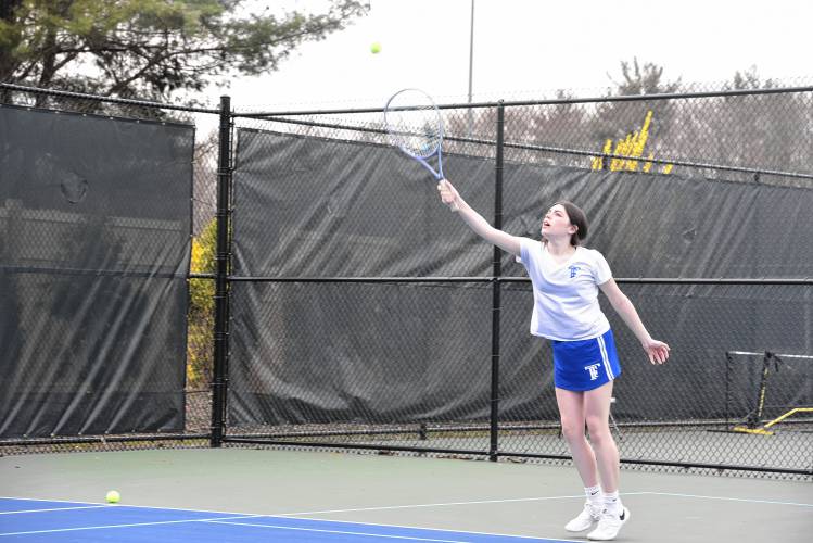 Turners Falls’ Gianna Marigliano serves in No. 2 singles against Frontier on Wednesday in South Deerfield. 