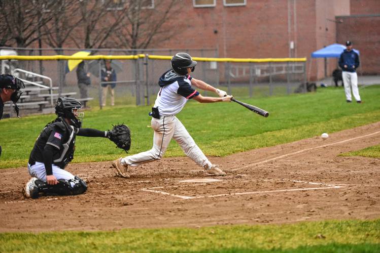 Frontier’s Nico Fasulo puts the bat on the ball against Pioneer on Wednesday in South Deerfield. 