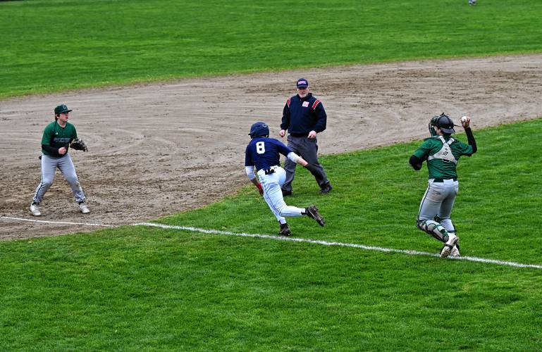 Frontier’s Rosco Palmer gets caught in a pickle between Greenfield third baseman Chase Zraunig and catcher  Luca  Siano  at Vets Field on Thursday. 