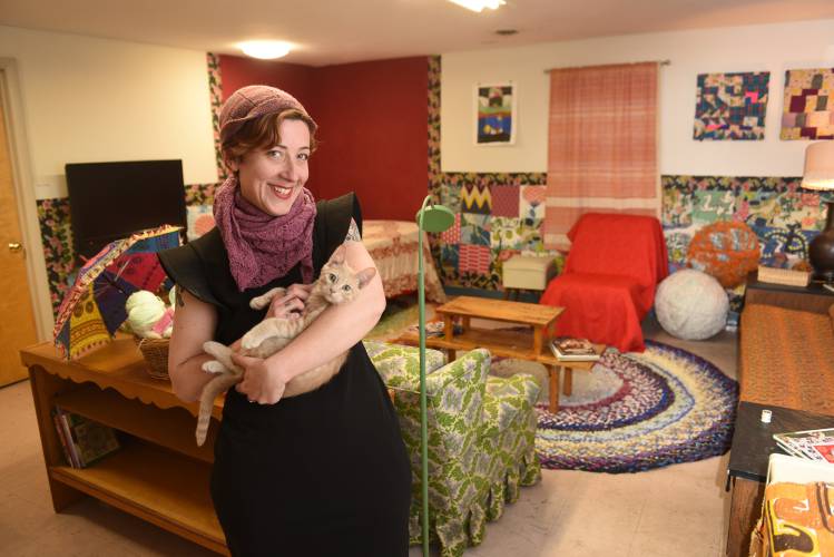 Kathryn Greenwood Swanson, pictured holding Pockets Jacquard, at The Stash House in 2022. After originally planning to operate two locations, Greenwood Swanson has brought Swanson’s Fabrics and The Stash House together under one roof at 320 Avenue A in Turners Falls.