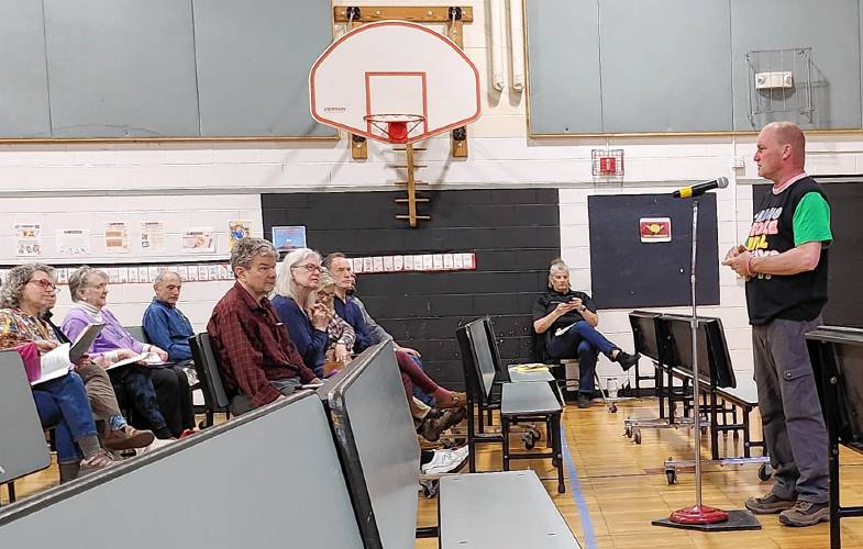 Highway Superintendent Steve Sullivan discusses a request for $29,500 for a storage unit, generator and propane tank during Shutesbury’s Annual Town Meeting on Saturday at Shutesbury Elementary School.