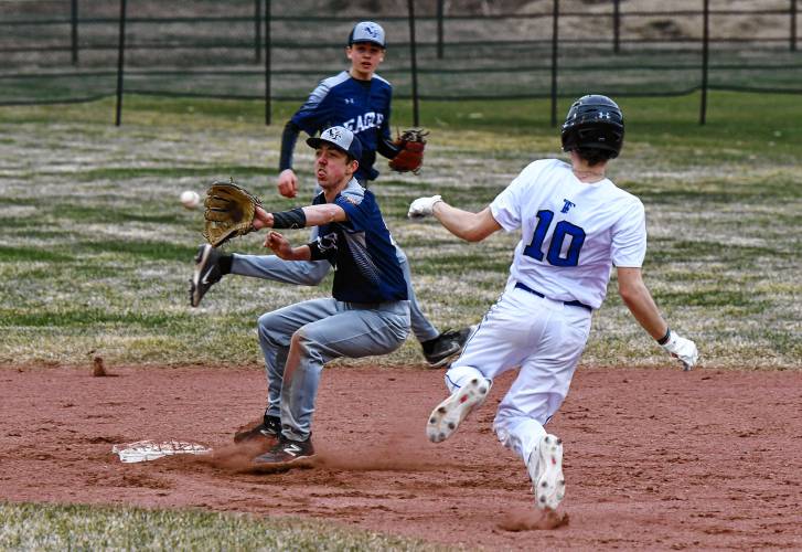 Franklin Tech’s Ben Dodge gets ready to tag out Turners Falls baserunner Cam Burnett at second base during the Eagles’ 9-5 victory at the Bourdeau Fields Complex in Turners Falls on Tuesday.
