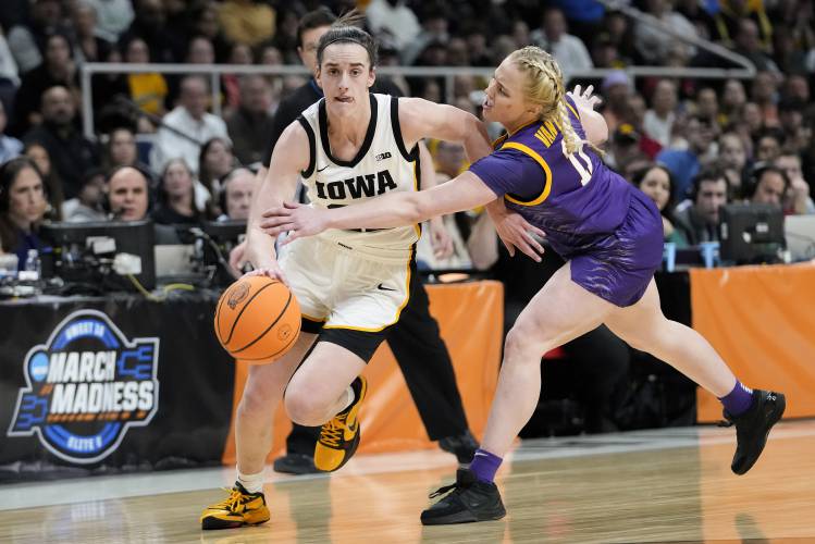 Iowa guard Caitlin Clark (22) drives against LSU guard Hailey Van Lith (11) during the first quarter of an Elite Eight round college basketball game during the NCAA Tournament, Monday, April 1, 2024, in Albany, N.Y. (AP Photo/Mary Altaffer)