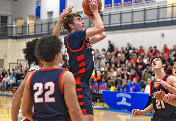 Mahar’s Will Barnes pulls up for a shot against Hoosac Valley during the Senators’ 76-44 loss in the MIAA Division 5 semifinals on Tuesday at West Springfield High School.