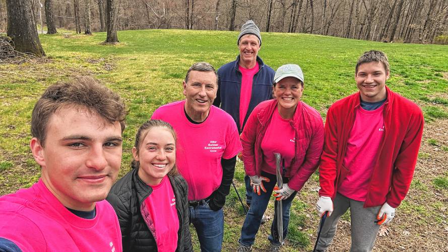 Tom Alber, Sarah Colby, Rob Alber, Craig Berry, Lisa Alber and Matvey Cronyn participate in a cleanup on Upper Road in Deerfield.