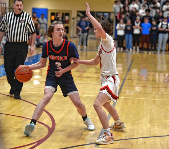 Mahar’s Morgan Softic (2) looks to make a pass against Hoosac Valley during the Senators’ 76-44 loss in the MIAA Division 5 semifinals on Wednesday at West Springfield High School.