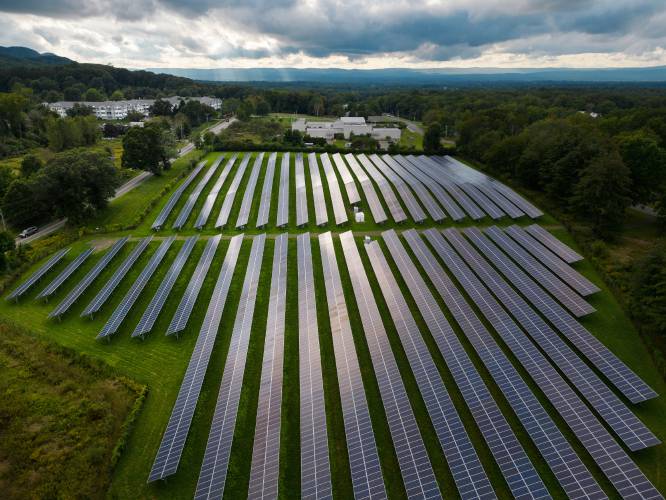 A field of solar panels along West Bay Road in Amherst. A recent report found Massachusetts had one of its worst years for solar development in the last decade.