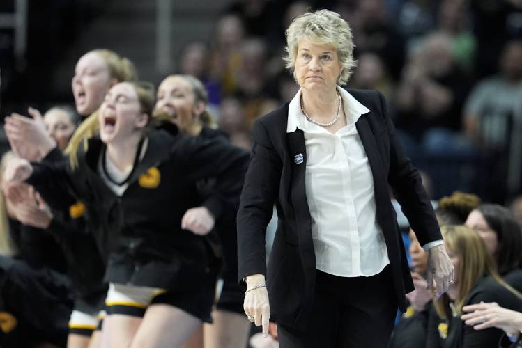 Iowa head coach Lisa Bluder reacts during the first quarter of an Elite Eight round college basketball game against LSU during the NCAA Tournament, Monday, April 1, 2024, in Albany, N.Y. (AP Photo/Mary Altaffer)