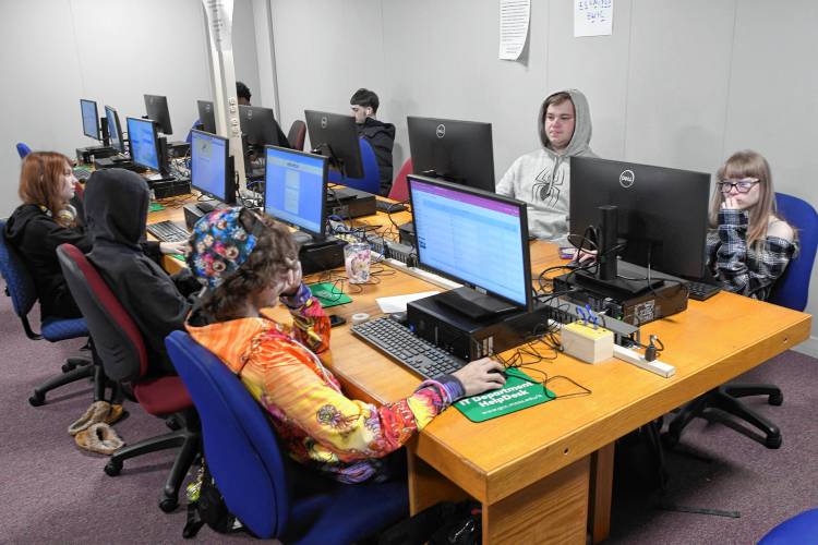 Greenfield High School students in the BEACON Learning Program work in a computer lab at Greenfield Community College last week. 