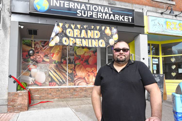 Owner Ruvim Rakhubenko at Wednesday’s grand opening of International Supermarket on Main Street in Greenfield.