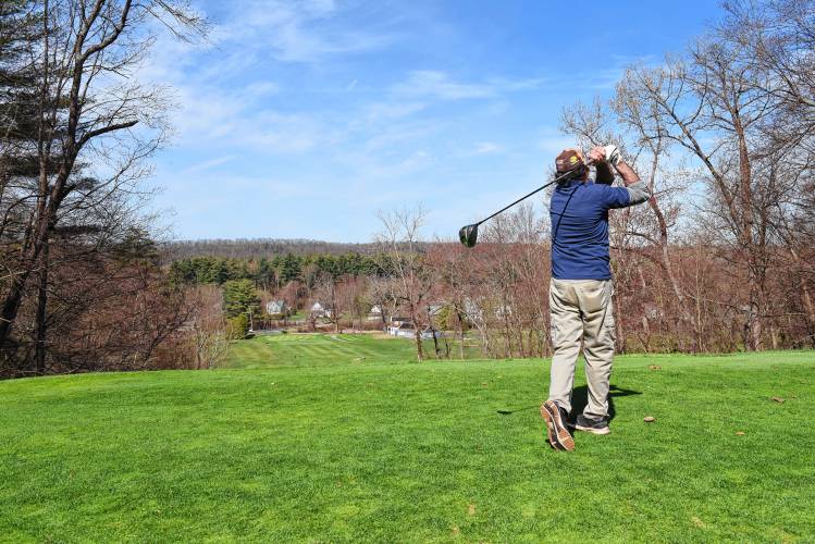 Teeing off on the first hole at Thomas Memorial Golf & Country Club in Turners Falls.
