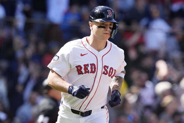 Boston Red Sox’s Tyler O'Neill runs on his solo home run during the first inning of an opening day game against the Baltimore Orioles at Fenway Park on Tuesday in Boston. 