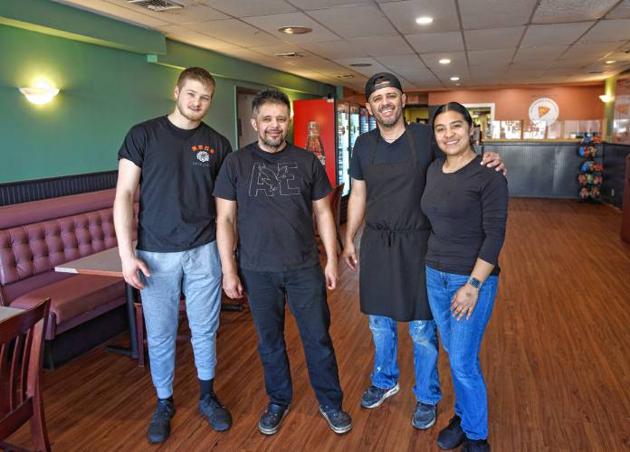 Avery Keller, Alfredo Rodas, Oscar Rodas and Claudia Rodas at Primo Restaurant & Pizzeria in South Deerfield. 