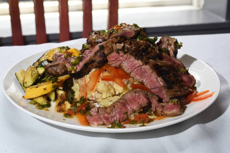 Watershed restaurant’s skirt steak served with garlic mashed potatoes, fresh zucchini and summer squash. After nearly two years in business, the Montague Center restaurant will close on Dec. 2.