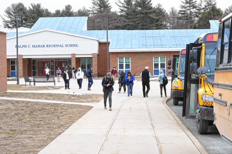 Students leave for the day at Ralph C. Mahar Regional School in Orange.