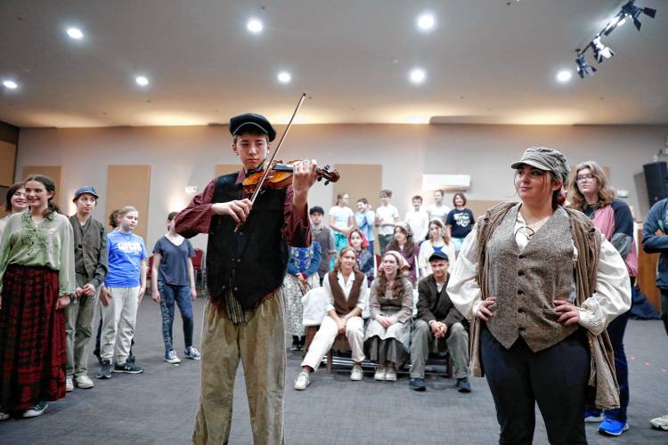 Cast members of Starlight’s Youth Theatre rehearse Saturday morning for their upcoming performance of “Fiddler on the Roof.” 