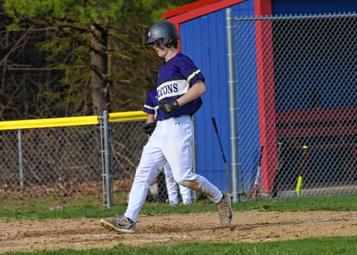 Smith Academy’s Garrett Willard (7) heads home to score a run after a passed ball against Mahar during the Senators’ 13-6 victory  on Monday in Orange.