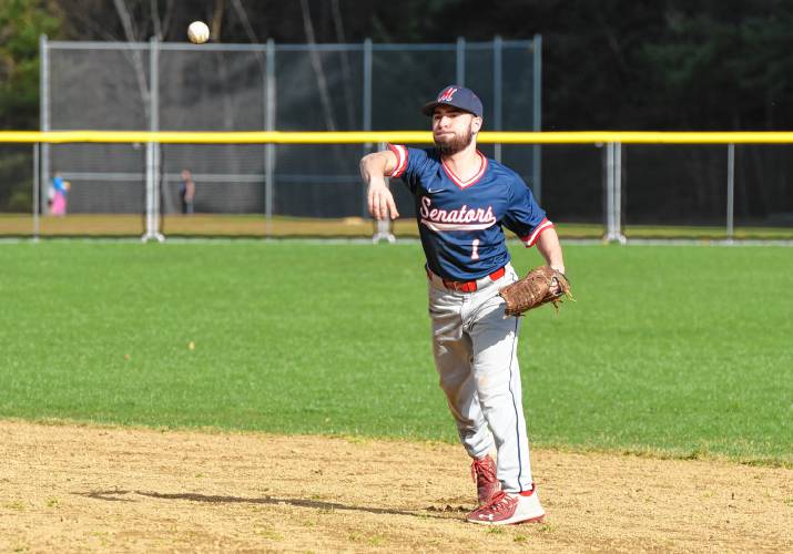 Mahar second baseman David Vitello (1) throws out a Smith Academy runner at first base during the Senators’ 13-6 victory on Monday in Orange.