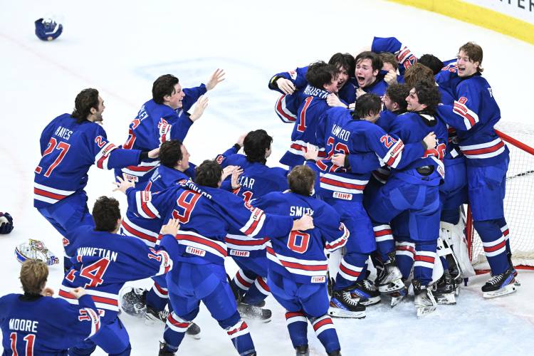 USA players celebrate winning the IIHF World Junior Championship ice hockey final match between Sweden and USA at Scandinavium in Gothenburg, Sweden, Friday Jan. 5, 2024. (Bjorn Larsson Rosvall/TT via AP)/TT News Agency via AP)