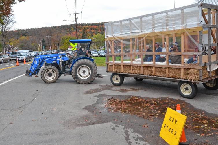 A hayride transports people at the 19th annual Scarecrow in the Park festival at Cushman Park in Bernardston.