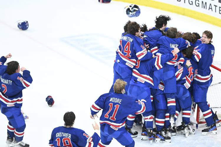 USA players celebrate winning the IIHF World Junior Championship ice hockey final match between Sweden and USA at Scandinavium in Gothenburg, Sweden, Friday Jan. 5, 2024. (Bjorn Larsson Rosvall/TT via AP)