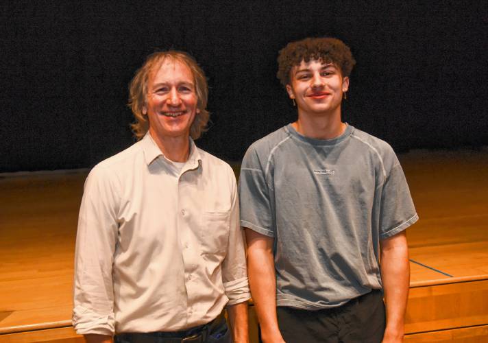 Turners Falls High School history teacher David Smith and senior Grayson Bowse were the recipients of the McGraw Uplift Award during an assembly at the school Friday morning.