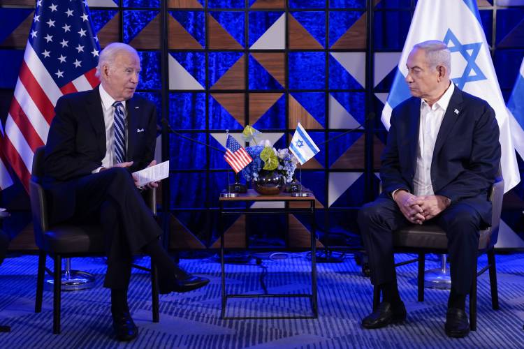 U.S. President Joe Biden speaks as he meets with Israeli Prime Minister Benjamin Netanyahu, Wednesday, Oct. 18, 2023, in Tel Aviv.