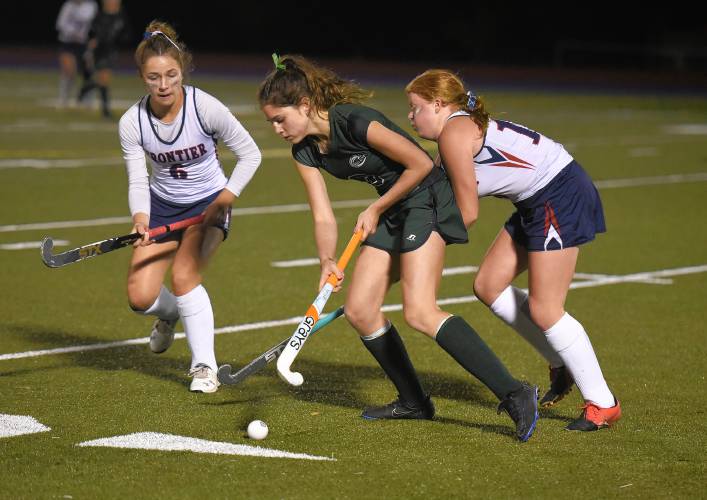 Greenfield’s Addie Harrington (3) holds possession while defended by Frontier’s Abbi Grover, right, and Ashley Taylor (6) during the Redhawks’ 1-0 win in the Class C final on Monday in Holyoke.