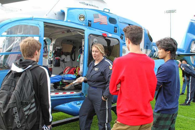 LifeStar flight paramedic Amanda DeTorio talks to Frontier Regional School students about her job while visiting the school for a demonstration on Wednesday.