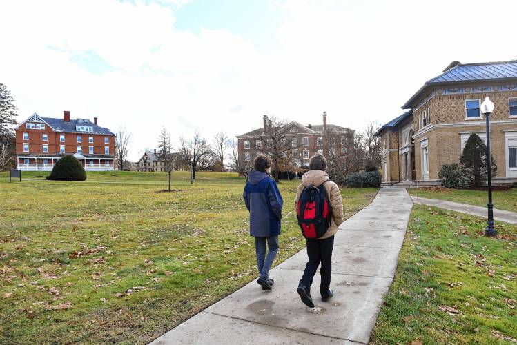 Students walk across the Thomas Aquinas College campus in Northfield. 