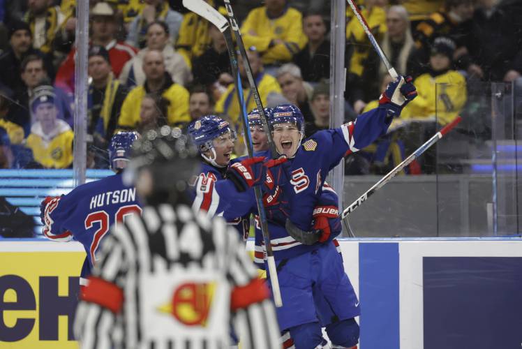 Amherst’s Ryan Leonard celebrates scoring a goal for the United States during the IIHF World Junior Championship gold medal game against Sweden at Scandinavium in Gothenburg, Sweden, Friday.