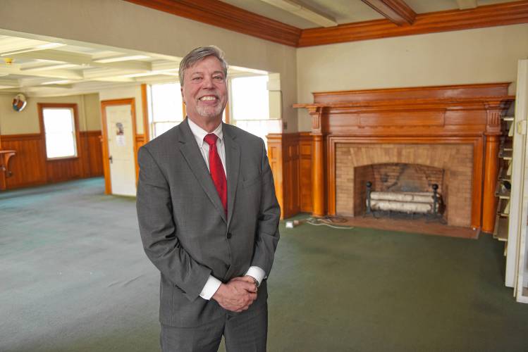 Thomas Meshako, president and CEO of Greenfield Savings Bank, inside the Leavitt-Hovey House, former home of the Greenfield Public Library. The bank officially gained ownership of the building on Wednesday.
