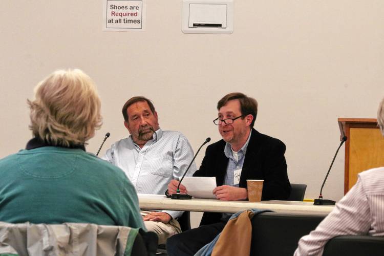 David Roulston and Charles “Chuck” Green, pictured during a candidates’ forum on Tuesday, are vying for one seat on the Greenfield Board of Assessors. 