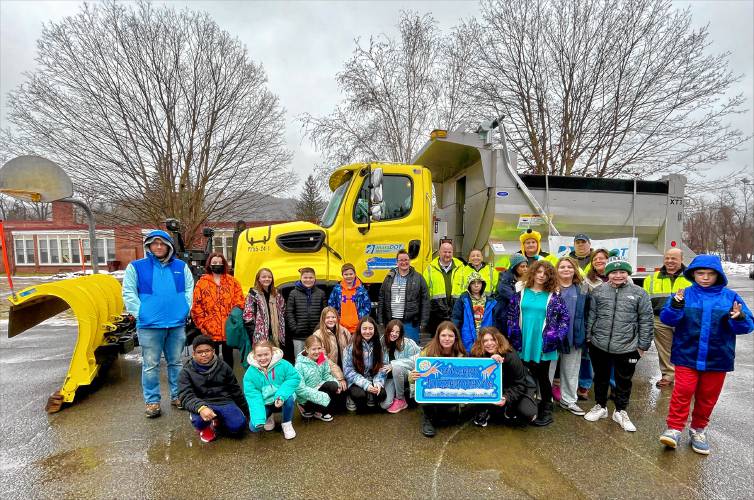 Representatives from the state Department of Transportation recently visited the winners of the second annual “Name a Snowplow” contest. Pictured is David Conlon’s sixth grade class at Buckland-Shelburne Elementary School in Shelburne Falls, which was declared a winner in District 1 with its entry, “Edward Blizzardhands.”