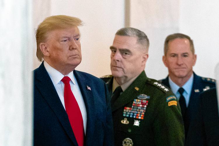 President Donald Trump prepares to address the nation from the White House on Jan. 8, 2020, on the ballistic missile strike that Iran launched against Iraqi air bases housing U.S. troops, accompanied by Joint Chiefs Chairman Gen. Mark Milley, center, and U.S. Air Force Chief of Staff Gen. David L. Goldfein.