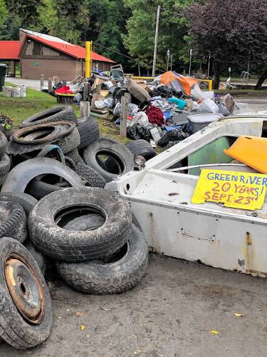 Trash and debris collected during the Green River Cleanup on Sept. 23 included a 10-foot boat.