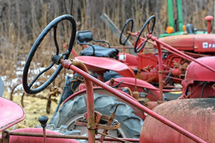 Tractors at Just Roots farm in Greenfield are parked out in the open due to a compromised barn.