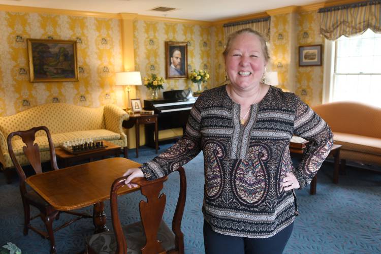 Innkeeper Laurie McDonald, pictured inside the Deerfield Inn in Old Deerfield, says the number of rooms available in the area could easily increase. “There is so much demand coming out this way,” she says. “I could have 500 rooms and they would still sell out in May.”