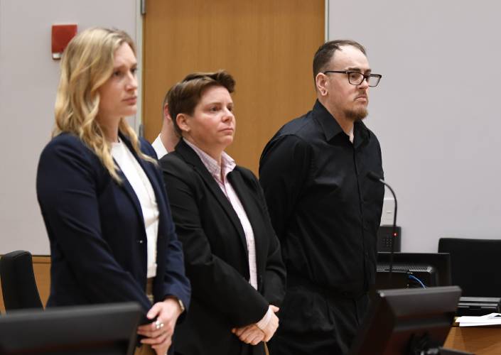 Defense attorneys Allison Pash and Emily Shallcross stand with their client, David Prue, during his sentencing on Tuesday morning in Franklin County Superior Court.