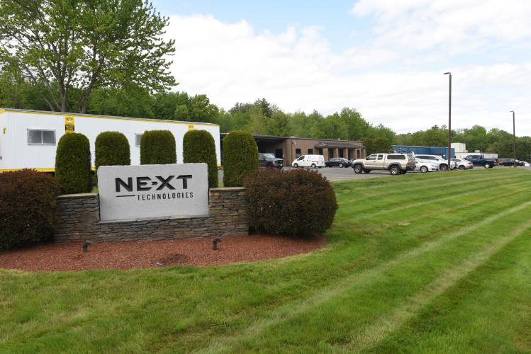 Greenfield Community College will soon graduate the first class of apprentices in a collaboration with precision manufacturer NE-XT Technologies, pictured.