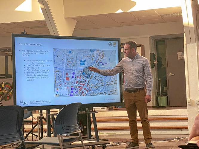VHB Massachusetts Land Planning Team Leader Luke Mitchell presents conceptual drawings of a potential senior housing development to Deerfield residents on Thursday evening.