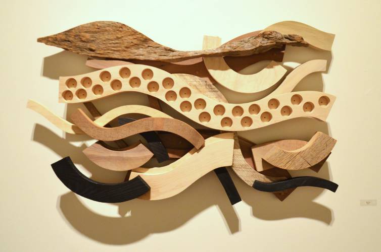 “Starting with some self-imposed limits, parts made from wood, aluminum, bronze, concrete, and plastic are added, cut out, repositioned or abandoned,” Bill Brayton wrote in his artist’s statement. “As a sculpture comes together, chance opportunities collide with the memory of previous decisions.”