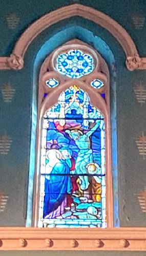 The Roman Catholic Diocese of Springfield is suing the city of Northampton seeking the right to remove five stained glass windows from the shuttered St. Mary of the Assumption Church. The diocese argues the windows have sacred value, including this one of the crucifixion of Jesus. 