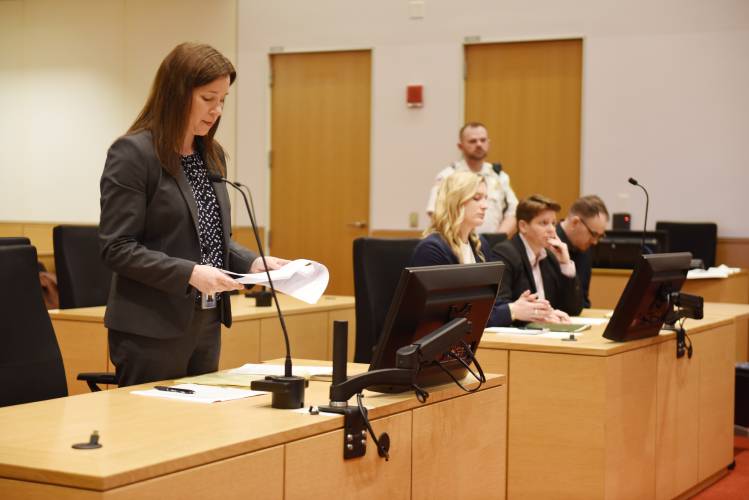 Assistant District Attorney Stephanie Jimenez reads the facts of the case to Superior Court Judge John Agostini with defense attorneys Allison Pash and Emily Shallcross sitting with their client, David Prue.