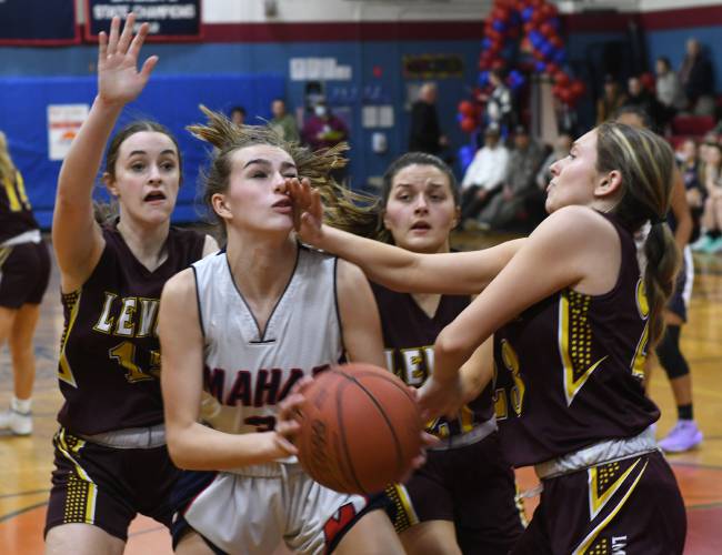 Mahar's Nevaeh Scribner (3) is fouled by Lenox's Alex Lipton (23) during a game in Orange last season.